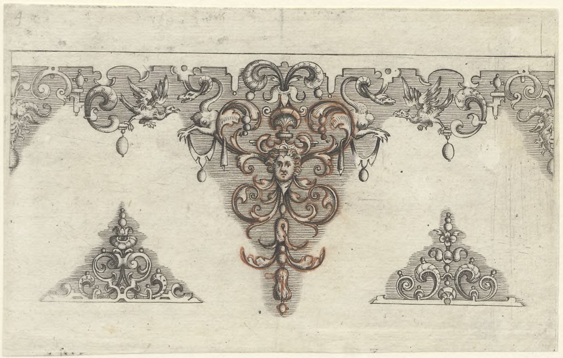 Ornamental border with a mascaron