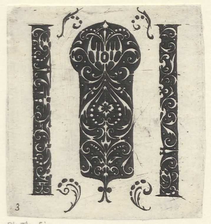 A shield-shaped jewelry design flanked by two blackwork pillars