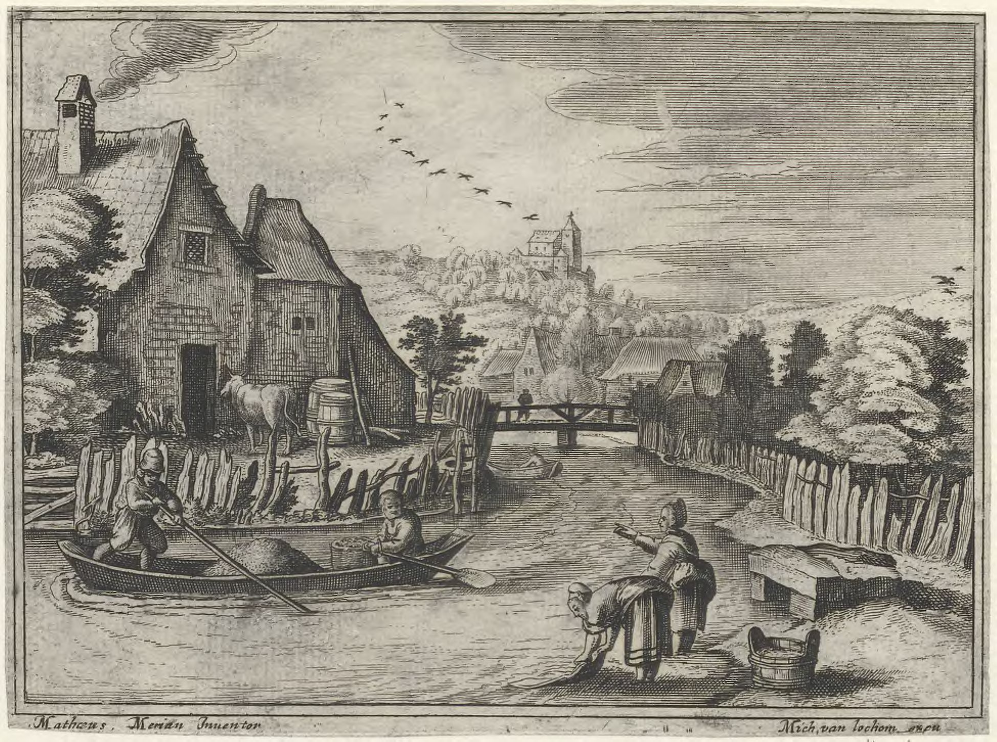 View of a village alongside a river