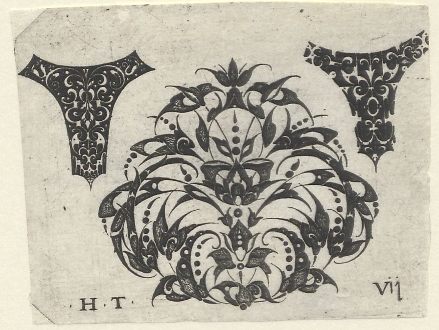Blackwork ornaments: A flower ornament flanked by two blackwork ornaments