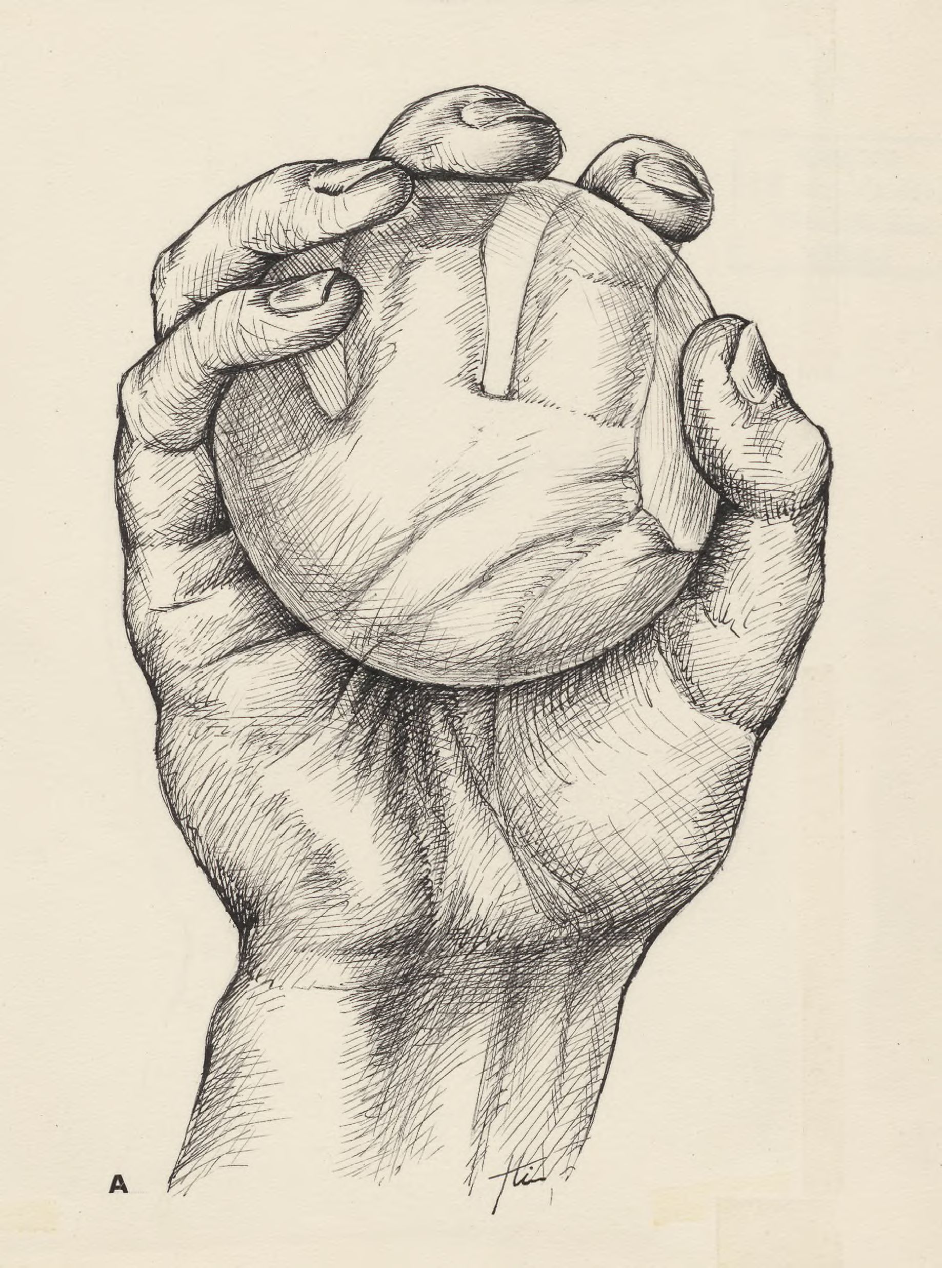 Hand holding a glass ball